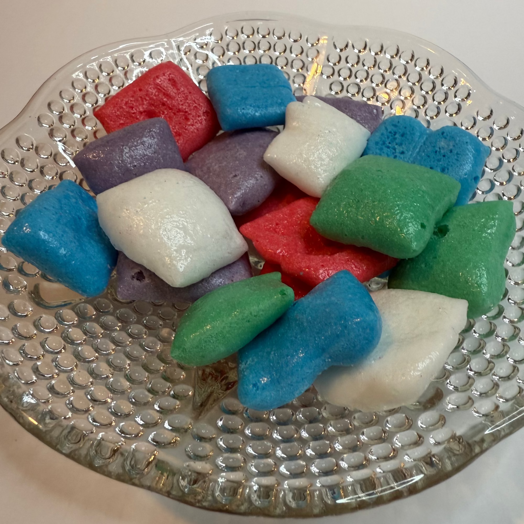 Freeze dried airheadz on a textured glass plate