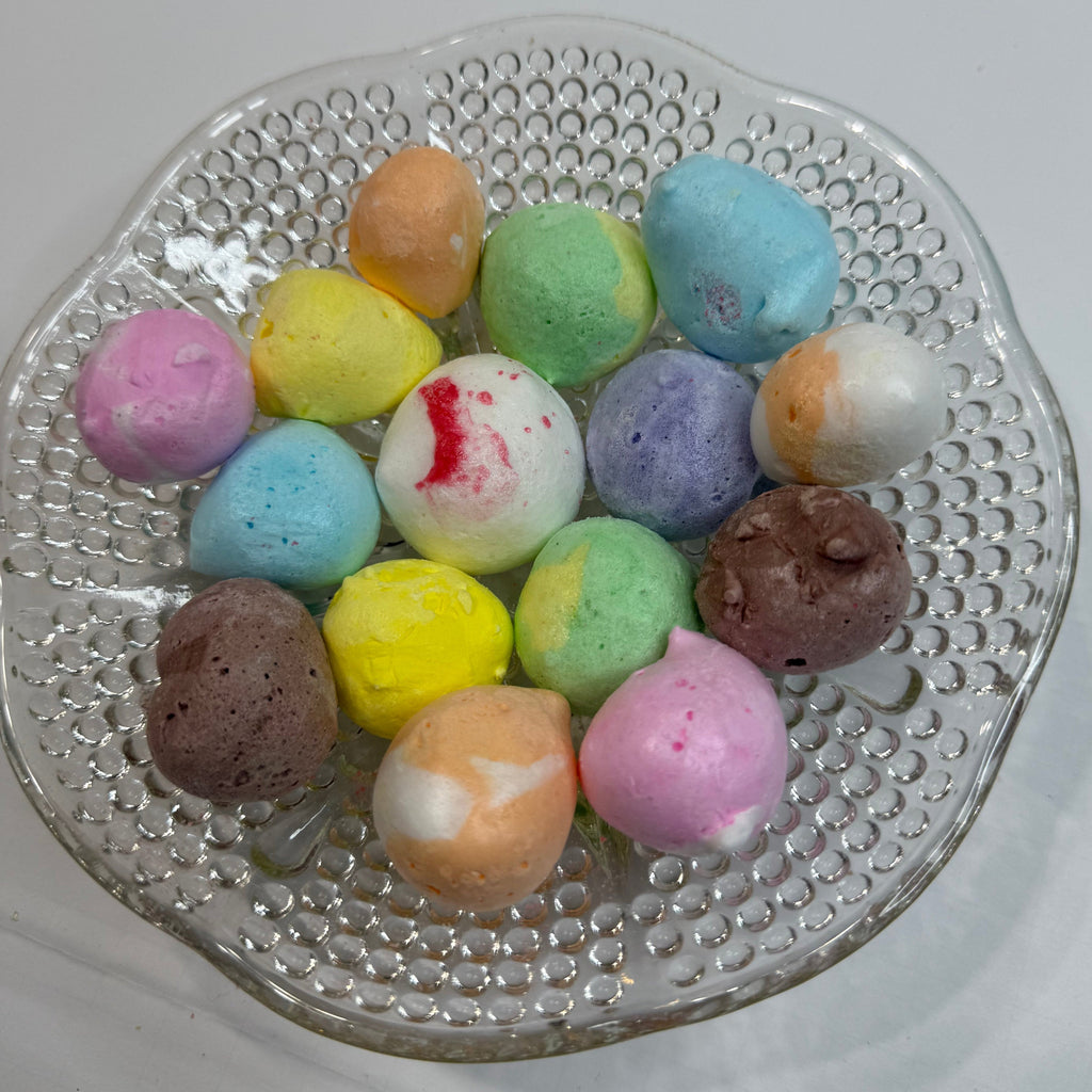 Freeze dried salt water taffy on a textured glass bowl