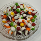 Freeze dried skittles on a decorative glass plate