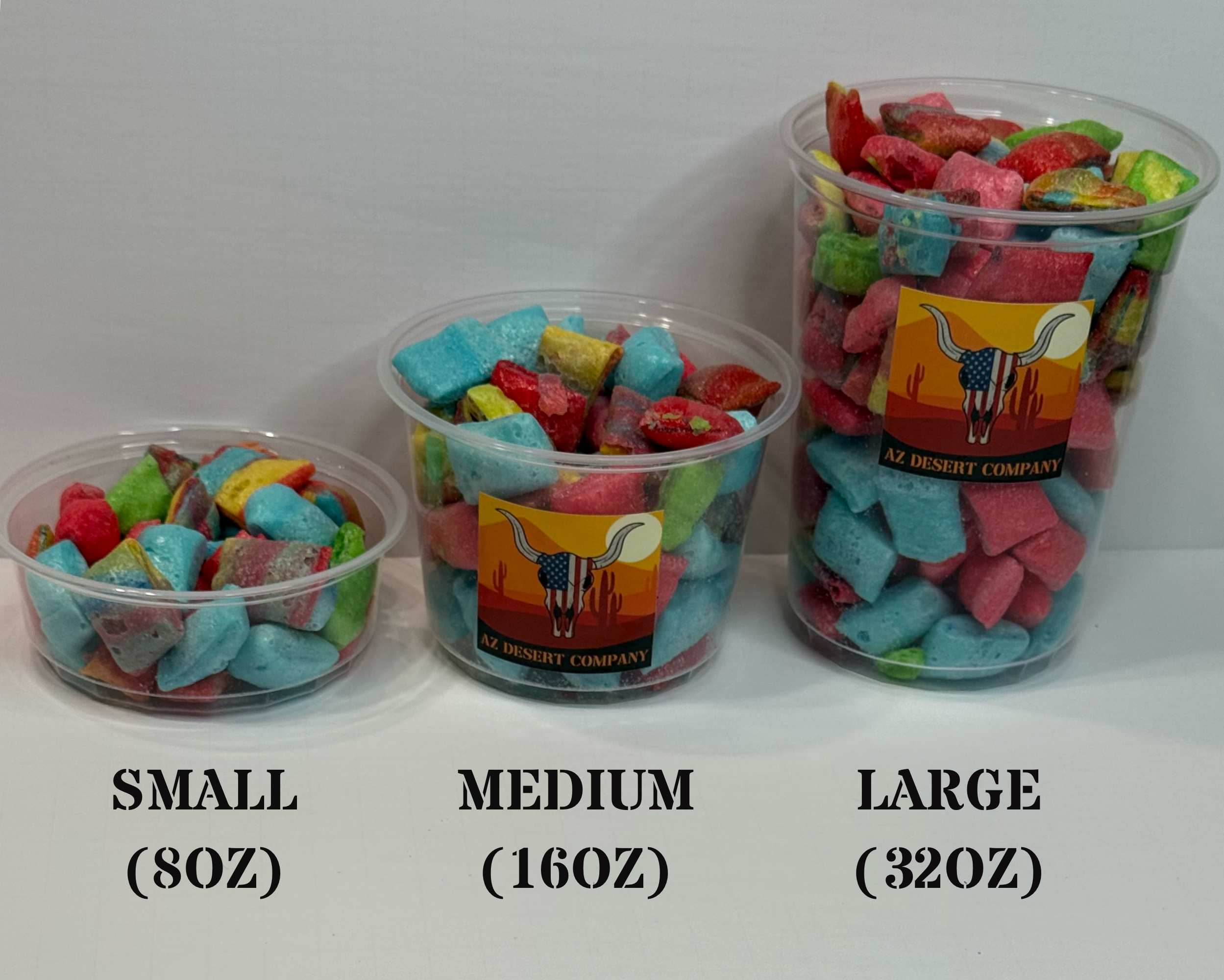 Three clear plastic containers labeled Small, Medium, and Large filled with colorful freeze dried candy on a white background.